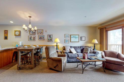 a living room with a couch and a table at Red Hawk Lodge 2286 in Dillon