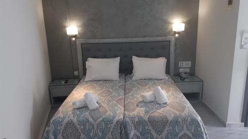 Katil atau katil-katil dalam bilik di Anita Beach Hotel- Adults Only