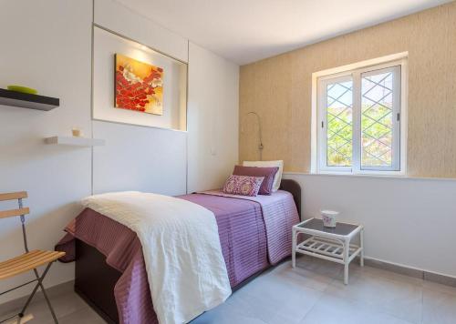 Postel nebo postele na pokoji v ubytování Lacy Golf Apartments