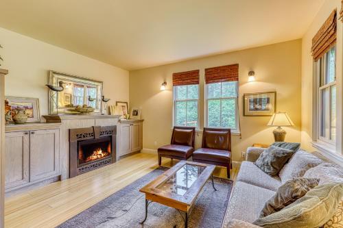 a living room with a couch and a fireplace at 3 Bed 3 Bath Vacation home in Eastsound in Eastsound