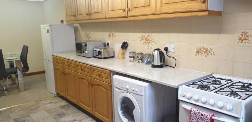 Kuchyň nebo kuchyňský kout v ubytování Swales cottage