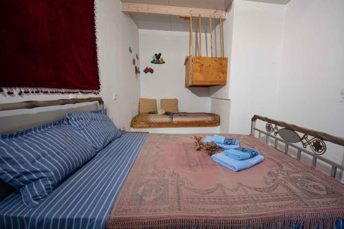 Säng eller sängar i ett rum på Castri House
