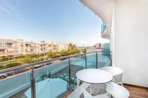 a balcony with a view of the ocean at Alcossebre Sea Experience in Alcossebre