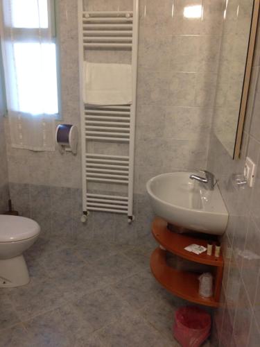 Koupelna v ubytování Albergo San Michele