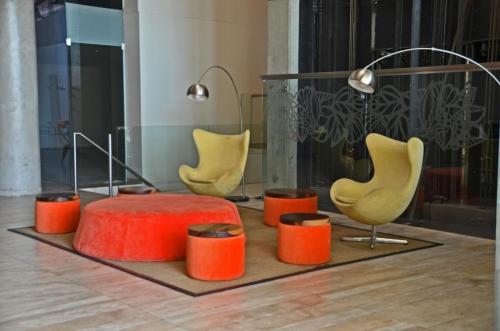 a group of chairs and a table in a room at CDM Temporal in Rosario