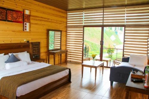 Postel nebo postele na pokoji v ubytování Aloft Grand Hotel Ella