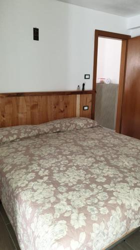 Ein Bett oder Betten in einem Zimmer der Unterkunft Appartamento