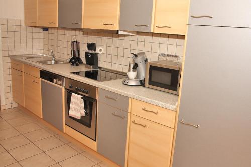 Η κουζίνα ή μικρή κουζίνα στο Willma Apartmenthaus