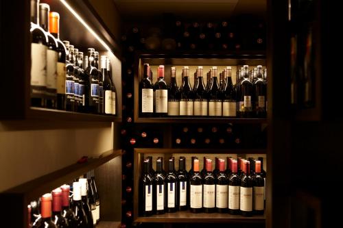 a bunch of bottles of wine in a cellar at Gutwinski Hotel in Feldkirch