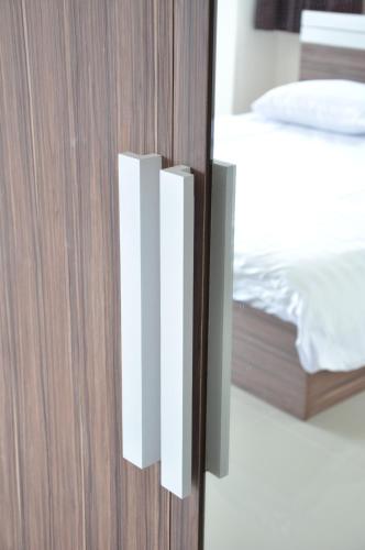 Postel nebo postele na pokoji v ubytování My Room Nakhon Pathom