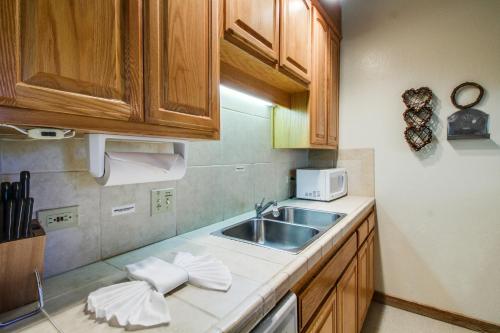 a kitchen with a sink and a microwave at Northstar Ski Trails in Truckee