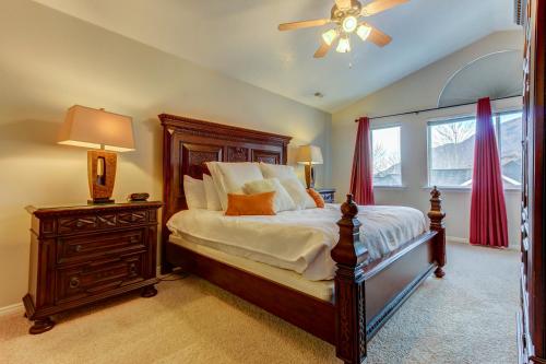 a bedroom with a bed and a ceiling fan at Oaks at Wasatch #5 in Cottonwood Heights