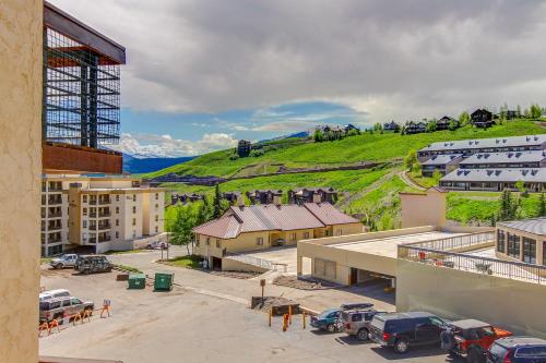 an aerial view of a city with a hill at Slopeside Paradise at Axtel in Mount Crested Butte