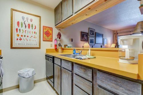 a kitchen with a sink and a counter at Slopeside Paradise at Axtel in Mount Crested Butte