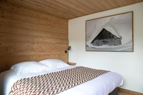 A bed or beds in a room at B&B Boutique Chalet Nono