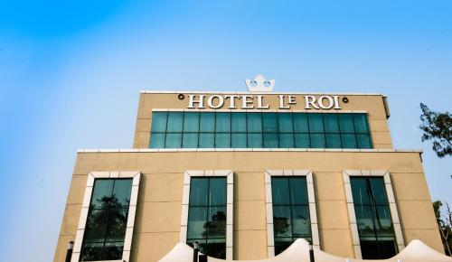 a hotel ifro building with a sign on it at Le Roi Digha in Digha