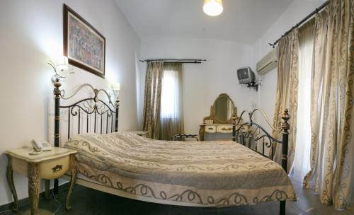 Postel nebo postele na pokoji v ubytování Malemi Organic Hotel