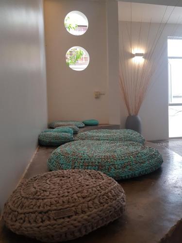 Ένα ή περισσότερα κρεβάτια σε δωμάτιο στο Baahu Villa