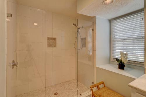 a bathroom with a shower with a glass door at 2 Bed 2 Bath Villa in Island,Shipyard - Hilton Head in Hilton Head Island