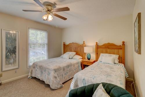 a bedroom with two beds and a ceiling fan at 2 Bed 2 Bath Villa in Island,Shipyard - Hilton Head in Hilton Head Island