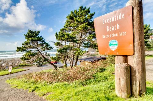 a sign for a beach restoration site at a beach at Netarts Bay and Ocean Views in Netarts