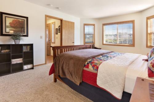 A bed or beds in a room at A Beach Loop Getaway