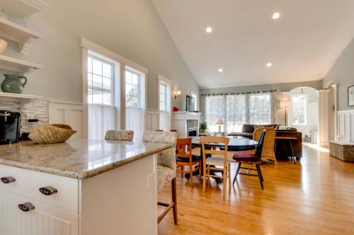 a kitchen and living room with a table and chairs at Bonnie Dune in Manzanita