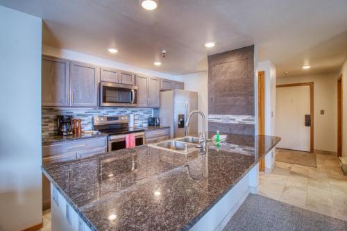 a kitchen with a sink and a counter top at Lakeview Marina Place in Dillon
