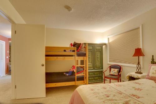 a bedroom with a bunk bed and a bed at Misty Ridges in Welches