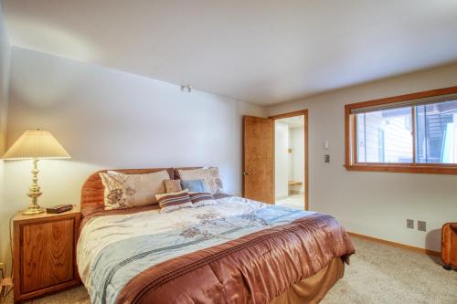 a bedroom with a large bed and a window at Lakeview Marina Place in Dillon