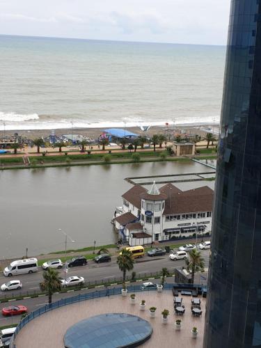 a view of the ocean from a building at Orbi city in Batumi