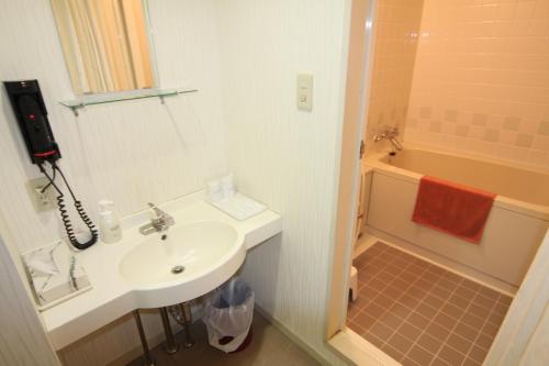 Un baño de Hotel Belle-Cour Inomata