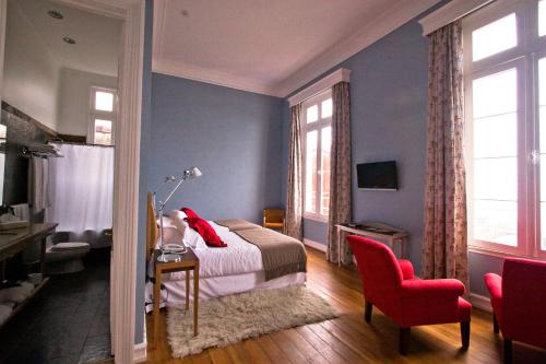 Uma TV ou centro de entretenimento em Zerohotel