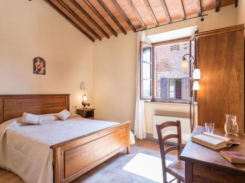 Postel nebo postele na pokoji v ubytování Agriturismo Baccoleno