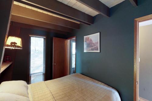Ένα ή περισσότερα κρεβάτια σε δωμάτιο στο Nason Creek Cabin