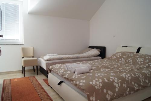 Ένα ή περισσότερα κρεβάτια σε δωμάτιο στο SOBE ROOMS GAVRILO