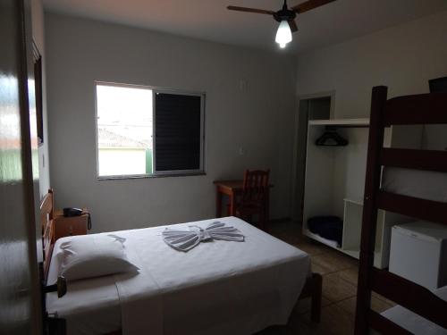 Postel nebo postele na pokoji v ubytování Hotel Brasil Real
