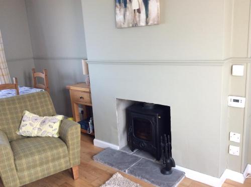 A television and/or entertainment center at Highland Holiday House 