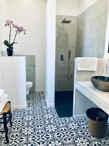 a bathroom with a toilet and a sink at Château de Saint-Girons - Luxury Guest House in Provence in Aix-en-Provence