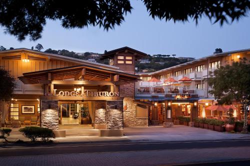 a hotel with a sign that reads the loveland inn at The Lodge at Tiburon in Tiburon