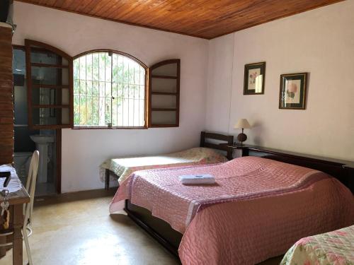 Postel nebo postele na pokoji v ubytování Pousada Verde Maratea