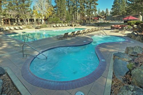 a large swimming pool with a bench at Seventh Mountain Resort in Bend
