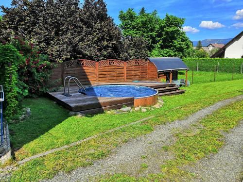 a swimming pool with a sink in a yard at Penzion u lázní in Velké Losiny