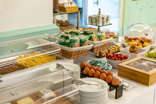 a refrigerator filled with lots of fruits and vegetables at Kora Park Resort in Formia