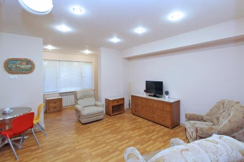 A television and/or entertainment center at Top Apartments - Yerevan Centre