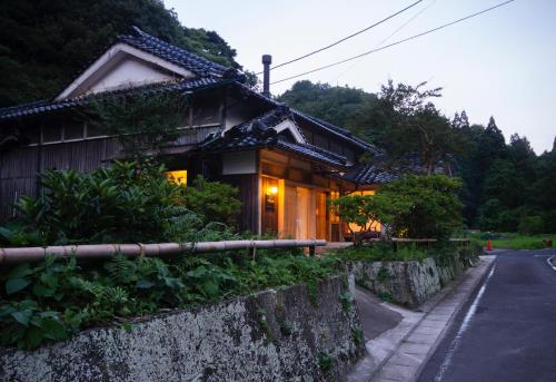 a house on the side of a road at HÏSOM in Ōda