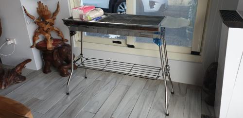 Kuchyň nebo kuchyňský kout v ubytování JiuZhiAn Apartment