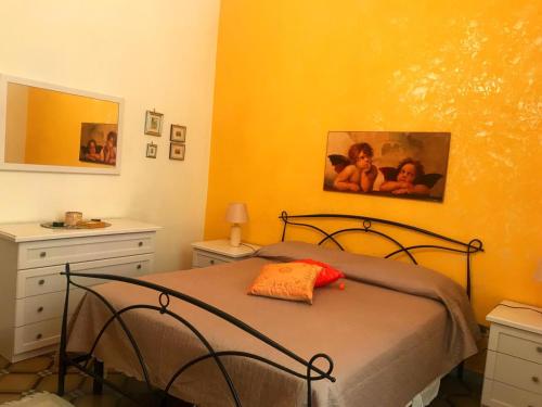 Postel nebo postele na pokoji v ubytování La Dimora di Ermes