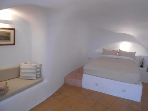 Postel nebo postele na pokoji v ubytování Rimida Villas