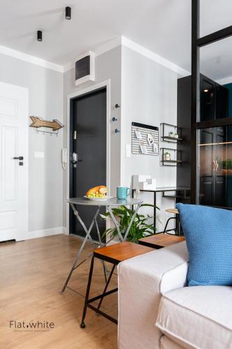 Ruang duduk di Apartamenty Flat White Obywatelska 47AB